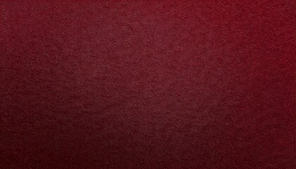 Fototapeta premium close-up of deep red velvet-finished paper with fine texture and smooth tactile surface 