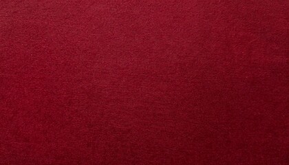 Fototapeta premium close-up of deep red velvet-finished paper with smooth surface and fine tactile texture 