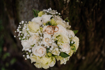 Elegant Wedding Bouquet with Roses and Rings