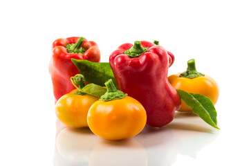 ripe red and yellow sweet peppers.