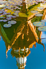 reflection in a lotus pond of part of the National Museum of Cambodia in Phnom Penh