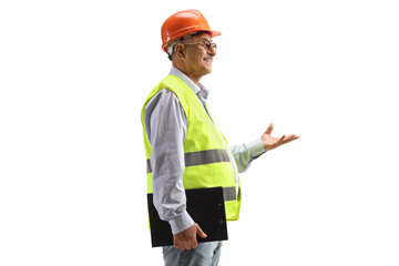 Male engineer with a safety vest and hardhat gesturing with hand