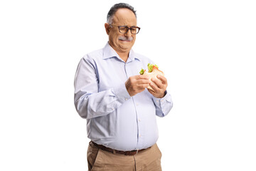 Man holding a sandwich and gesturing disgust and nausea