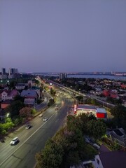 Aerial view of the road in the city at night. Top view