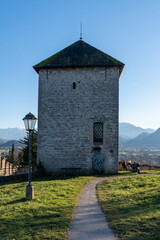 Fototapeta premium Buildings and castles in the fields around the Hohensalzburg fortress, Salzburg, Austria at the Monchsberg hiking trail