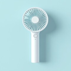 White handheld mini fan on blue background. (1)