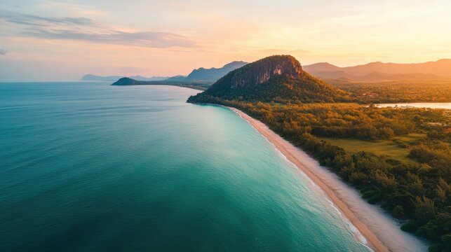 Scenic Aerial View of Serene Beach and Mountain Landscape at Sunset with Clear Sky and Copy Space for Text Integration