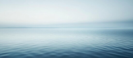 Obraz premium Serene Water Surface Reflecting Elegance and Versatility with Ample Copy Space for Text Use