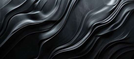 Obraz premium Elegant black marble stone texture with soft flowing waves and subtle lines ideal for background or blank text space in design projects