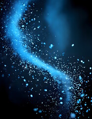 A burst of blue dust particles against a dark vertical background