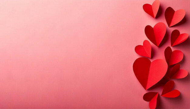 Corazones rojos de papel sobre fondo rosa. D&iacute;a de los enamorados, San Valent&iacute;n. fondo
