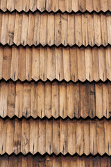 Old traditional wooden shingled roof pattern background, copy space