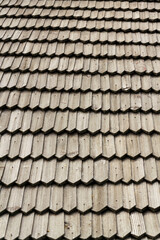 Old traditional wooden shingled roof pattern background, copy space