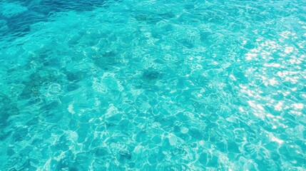 Crystal Clear Aqua Marine Water Surface with Sunlight Reflections