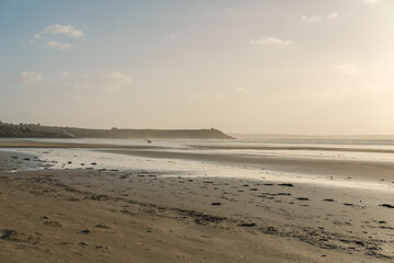 Windsurfing at sunset on Pentrez beach, Brittany