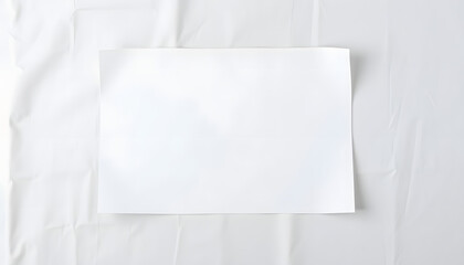 Blank sheet of paper on white fabric linen background. isolated with white shades