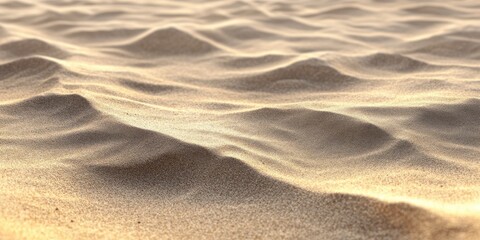 Golden sand dunes with smooth textures in desert environment captured in soft light