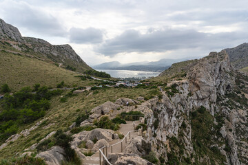 Cap de Formentor, Mallorca, Spain 25.10.2021 - Hiking trail with safety railings leading to Port de Pollenca bay overlook.