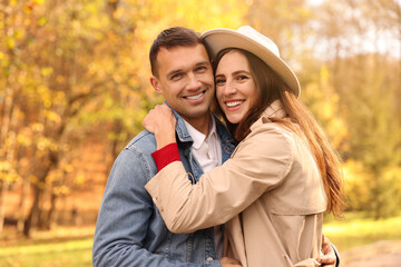 Fototapeta premium Happy couple spending time together in autumn park