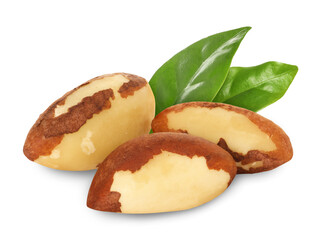 Brazil nuts and green leaves isolated on white