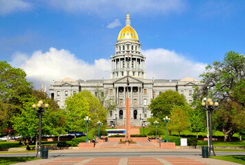Tourists and visitors show walking around the State Capitol Building Denver Colorado