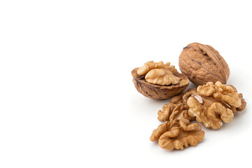 Whole and Shelled Walnuts – Versatile Nutty Ingredients Placed on Right Side of White Background with Copy Space