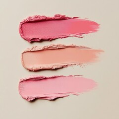 Various shades of cream and blush laid out on a neutral background for artistic purposes