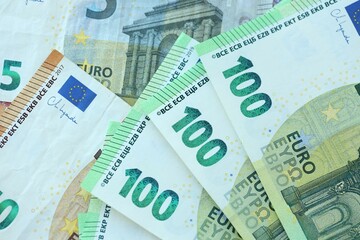 Obraz premium Many real european euro banknotes in big pile