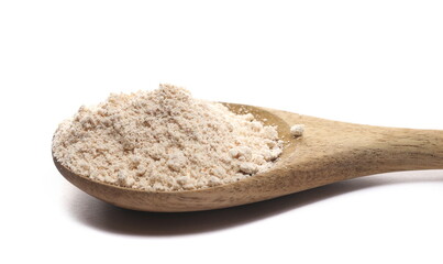Integral spelt flour in wooden spoon, isolated on white, side view