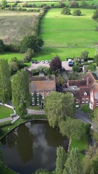 luxurious country house mansion england elegant design beautiful surroundings highlight appeal real estate opportunity circling aerial drone shot luxury property uk scenic view 
