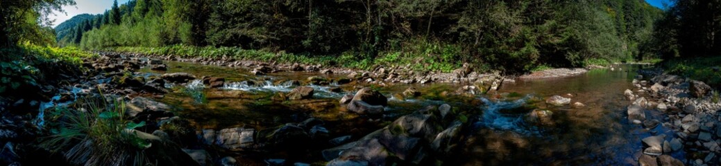 Obraz premium panorama with the river in the mountains on an autumn day