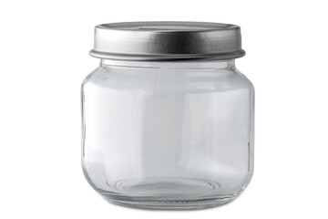 Empty small glass jar with silver colored lid isolated