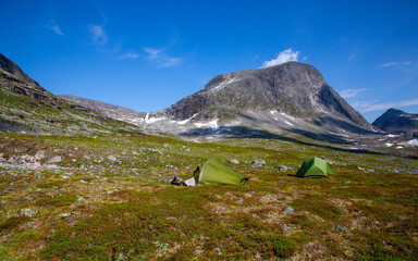 Tent trip in the mountains, with fishing as the purpose.