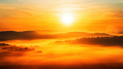 Obraz premium A stunning sunrise casts a soft golden light over the desert, illuminating the sand dunes while a thin mist gently rises from the ground, creating a tranquil and magical atmosphere. 