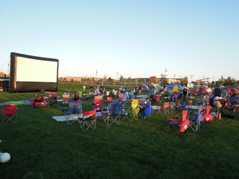 Preparation for evening outdoor movie show, Erie, Colorado