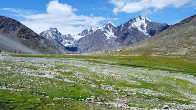 An aerial view of stupas of kunzum pass at 4,590 m is a high mountain pass on kunzum range of the himalayas. View of prayer flags with stupas Kunzum Pass at spiti, himachal pradesh, India.