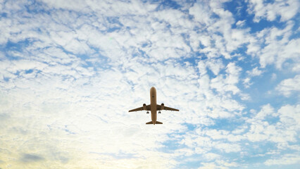 ULTRA HD. Airplane flies in blue sky. Travel, tourism. Airplane takes off against the background of blue sky.  