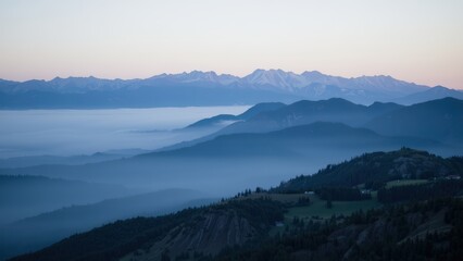 Tranquil Dawn: Misty Mountain Layers in Blue Hour Serenity