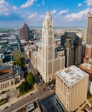 High-angle view of downtown city buildings, including the impressive Keystone Building. Urban landscape, showcasing architectural diversity. DOWNTOWN, COLUMBUS, OHIO, UNITED STATES
