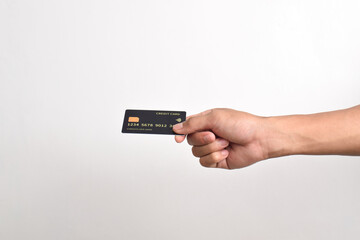 male hand holding black Bank credit Card mockup template isolated on white background