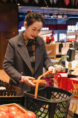 Joyful Woman Shopping for Fresh Produce in a Modern Grocery Store