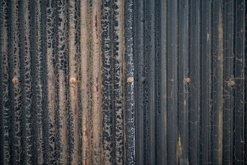 錆びた古いトタンの壁	