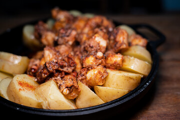 Galician-style Octopus served in black iron pan