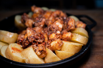 Galician-style Octopus served in black iron pan