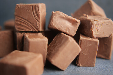 dark chocolate on a plate on table close up 