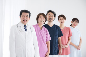 Smiling camera eyes on doctors and nurses enjoying and succeeding in their new jobs, etc.