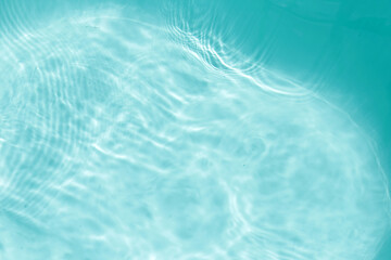 The blue water reflects light on the surface.