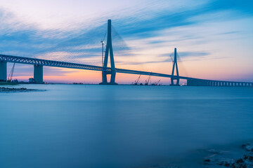 suzhou Yangtze River Bridge and the beautiful scenery of the Yangtze River and sunset in Jiangsu Province, China on August 20, 2024