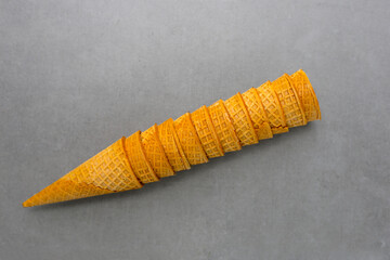 Waffle cones on grey background