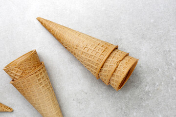 Waffle cones on grey background